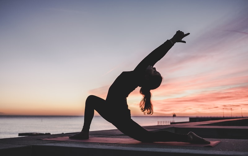 Gentle stretching in a bright, minimalist studio space